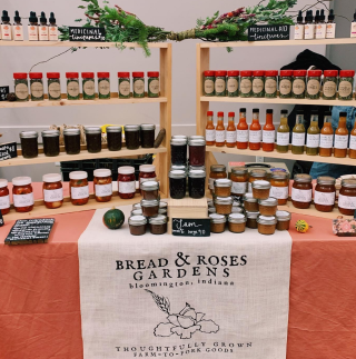 Bread & Roses Gardens table display at the November market, courtesy of Bread & Roses Gardens Instagram page